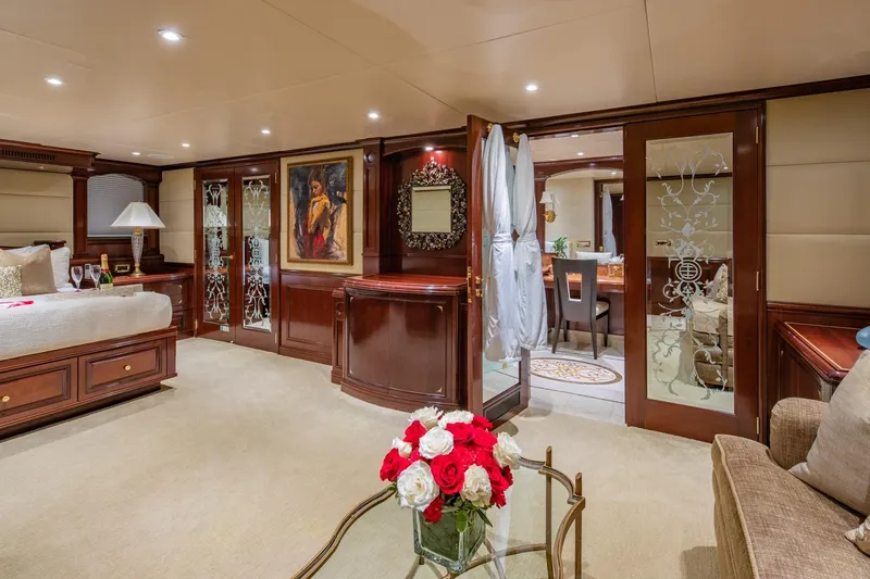 Starship Yacht Photos Pics Luxurious interior of 1986 Van Mill 144 Motor Yacht with elegant decor and floral arrangement.