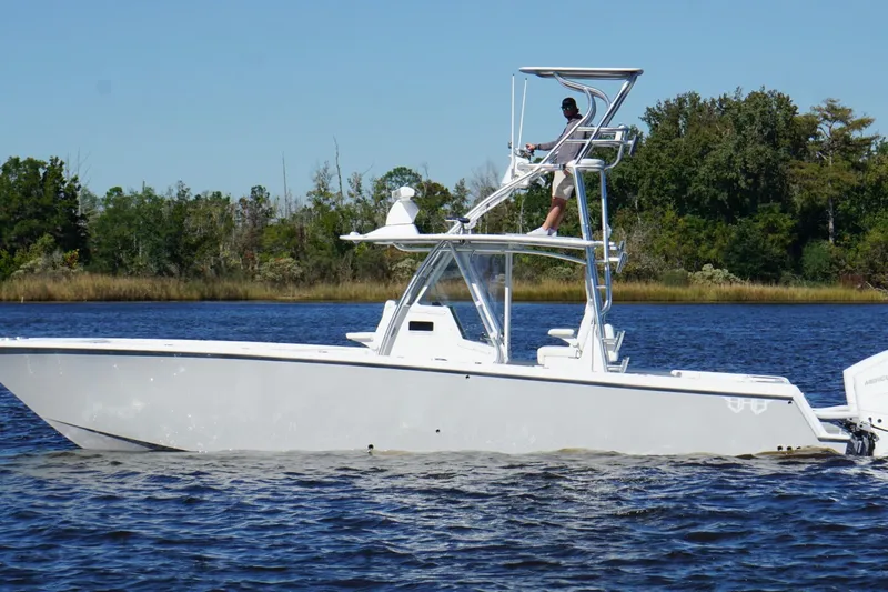  Yacht Photos Pics Custom HHH 35LX Catamaran 2020 on water, featuring elevated helm and sleek design.