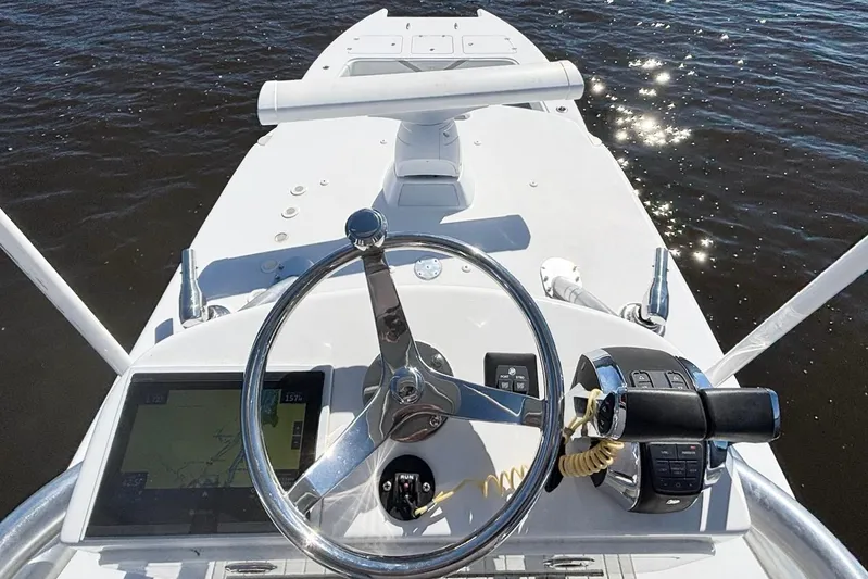  Yacht Photos Pics Helm of 2020 Custom HHH 35LX Catamaran with steering wheel and controls, on water.