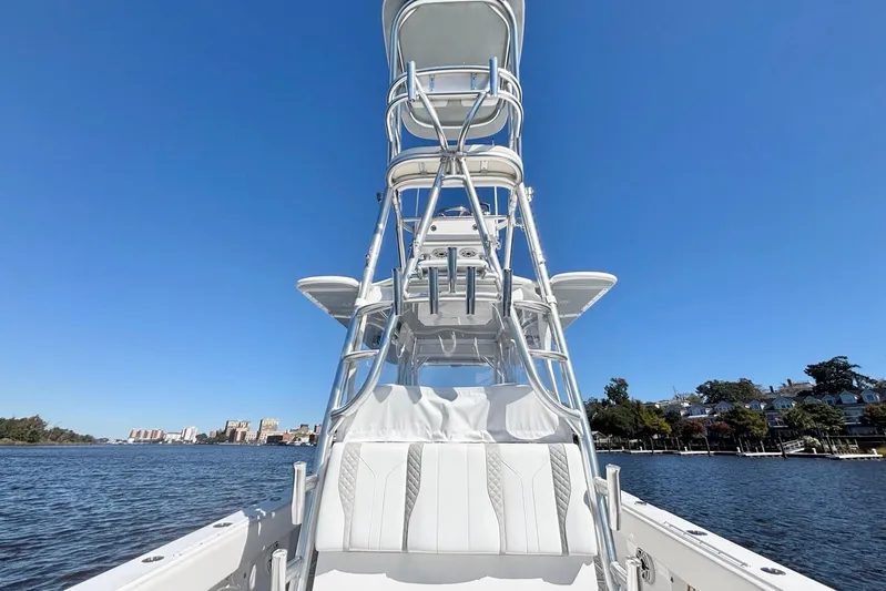  Yacht Photos Pics Custom HHH 35LX Catamaran 2020 on water, featuring sleek design and clear blue sky.