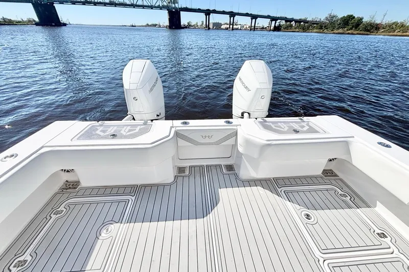  Yacht Photos Pics Custom HHH 35LX Catamaran 2020 with twin Mercury engines on a calm river.