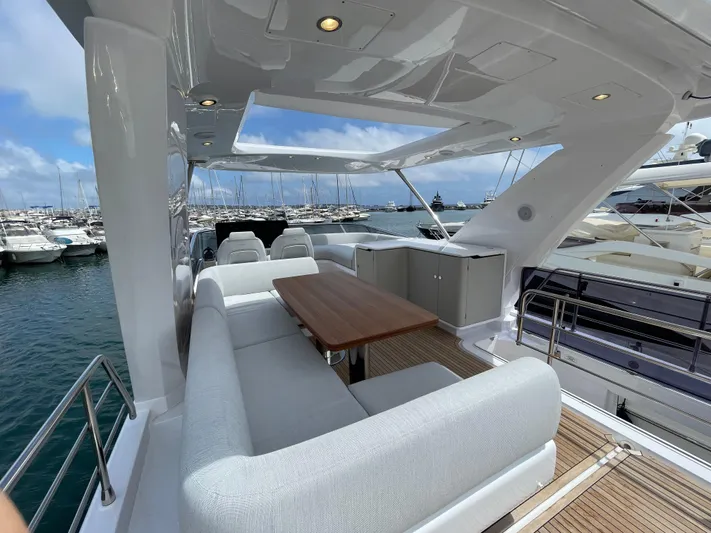 Melita Yacht Photos Pics Azimut 60 Flybridge 2023 yacht with elegant seating and ocean view.