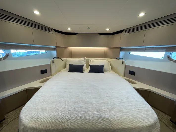 Melita Yacht Photos Pics Luxurious bedroom interior of 2023 Azimut 60 Flybridge yacht with modern design.