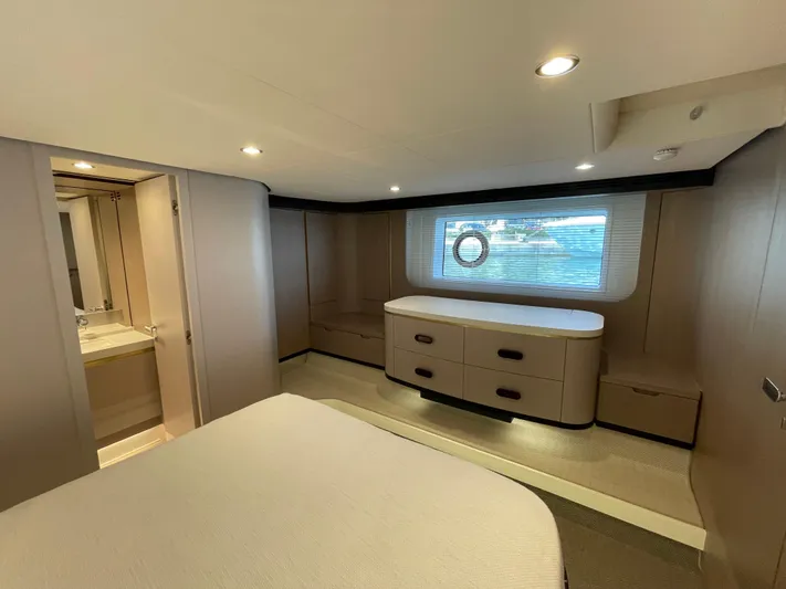 Melita Yacht Photos Pics Luxurious cabin interior of Azimut 60 Flybridge 2023 yacht, featuring modern design and ample lighting.
