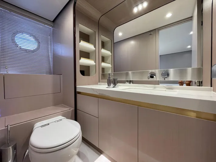 Melita Yacht Photos Pics Luxurious bathroom in Azimut 60 Flybridge 2023 yacht, featuring modern fixtures and elegant design.