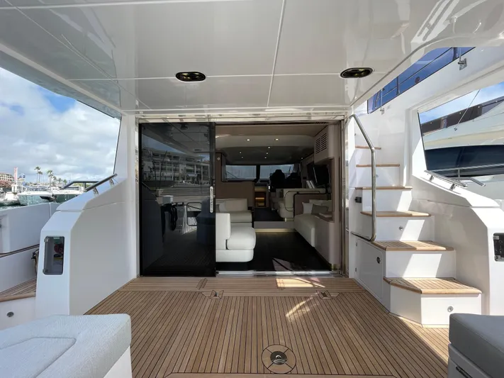 Melita Yacht Photos Pics Azimut 60 Flybridge 2023 yacht interior with teak deck and modern furnishings.