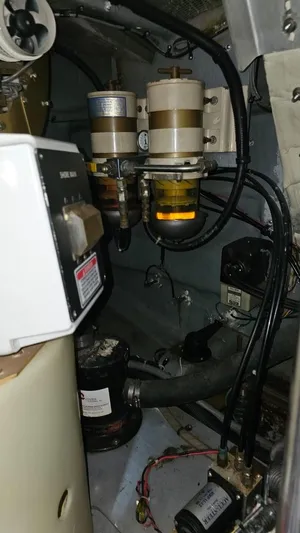  Yacht Photos Pics Engine room of 1999 Sea Ray 460 Sundancer with fuel filters and wiring.