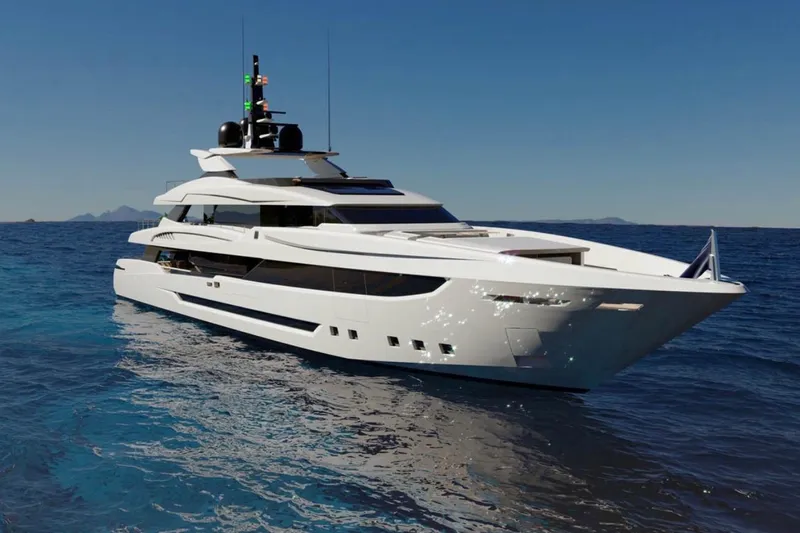  Yacht Photos Pics Luxurious 2007 Austal Doll yacht cruising on clear blue ocean waters.