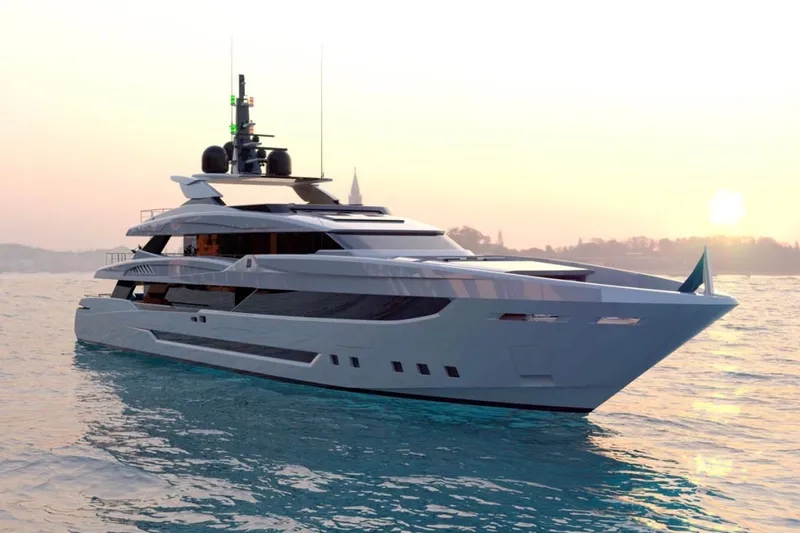  Yacht Photos Pics Luxurious 2007 Austal Doll yacht cruising at sunset on serene waters.