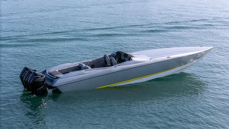  Yacht Photos Pics 2017 Nor-Tech 3900 Super-VEE speedboat on calm water, featuring sleek design and powerful engines.