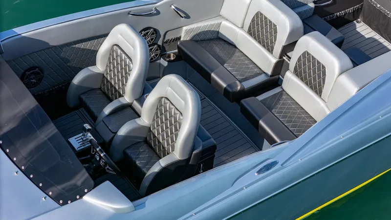  Yacht Photos Pics Luxurious interior of 2017 Nor-Tech 3900 Super-VEE boat with diamond-stitched seating.