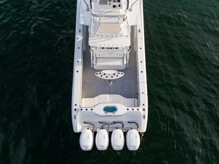 Yacht Photos Pics Aerial view of a 2022 Yellowfin 42 boat with four outboard engines.