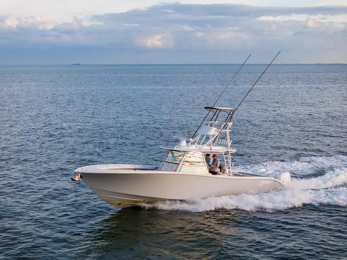  Yacht Photos Pics 2022 Yellowfin 42 boat cruising on open water.