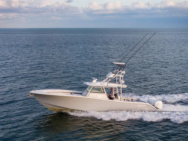  Yacht Photos Pics 2022 Yellowfin 42 boat cruising on open water.