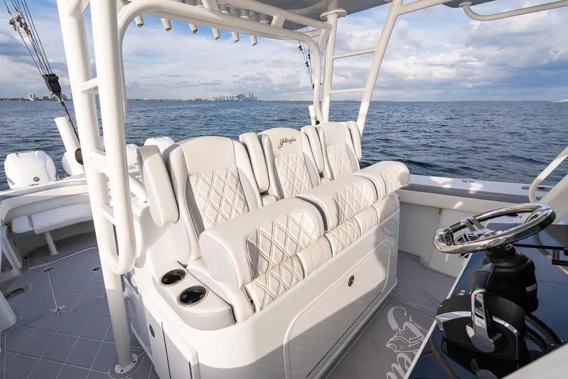  Yacht Photos Pics 2022 Yellowfin 42 boat with luxurious seating and ocean view.
