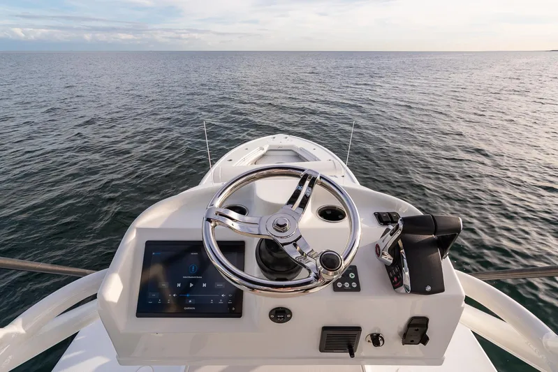  Yacht Photos Pics 2022 Yellowfin 42 boat helm with ocean view.