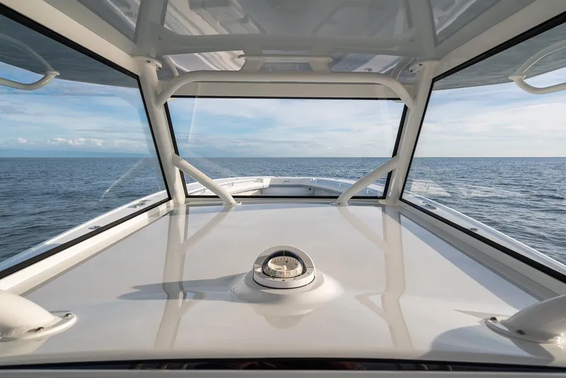  Yacht Photos Pics View from the helm of a 2022 Yellowfin 42 boat on open water.