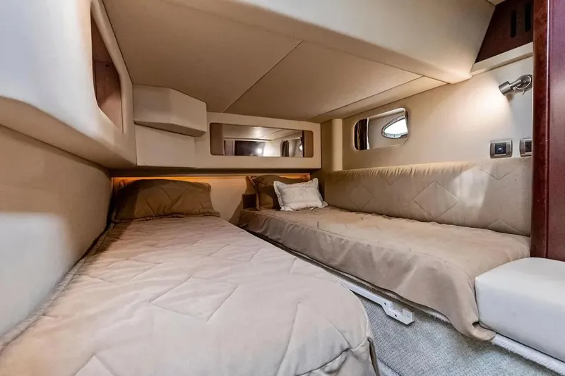 Megusta Yacht Photos Pics 2007 Sea Ray 44 Sedan Bridge cabin with twin beds and modern interior design.