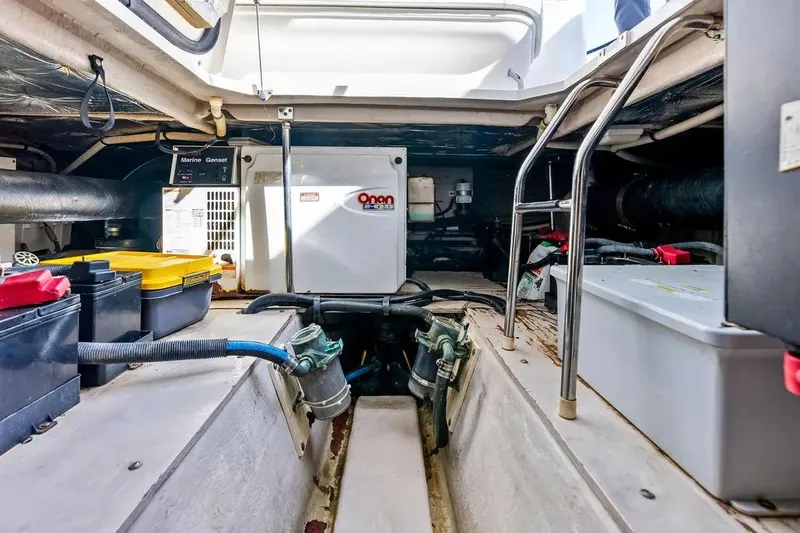 Megusta Yacht Photos Pics Engine room of 2007 Sea Ray 44 Sedan Bridge with Onan generator and marine equipment.