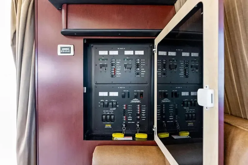 Megusta Yacht Photos Pics Electrical panel inside 2007 Sea Ray 44 Sedan Bridge yacht, featuring control switches and meters.