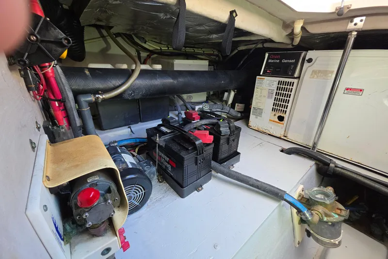 Megusta Yacht Photos Pics Engine room of 2007 Sea Ray 44 Sedan Bridge with batteries and marine generator.