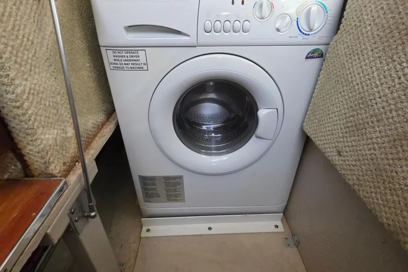 Megusta Yacht Photos Pics Washing machine in 2007 Sea Ray 44 Sedan Bridge yacht interior.