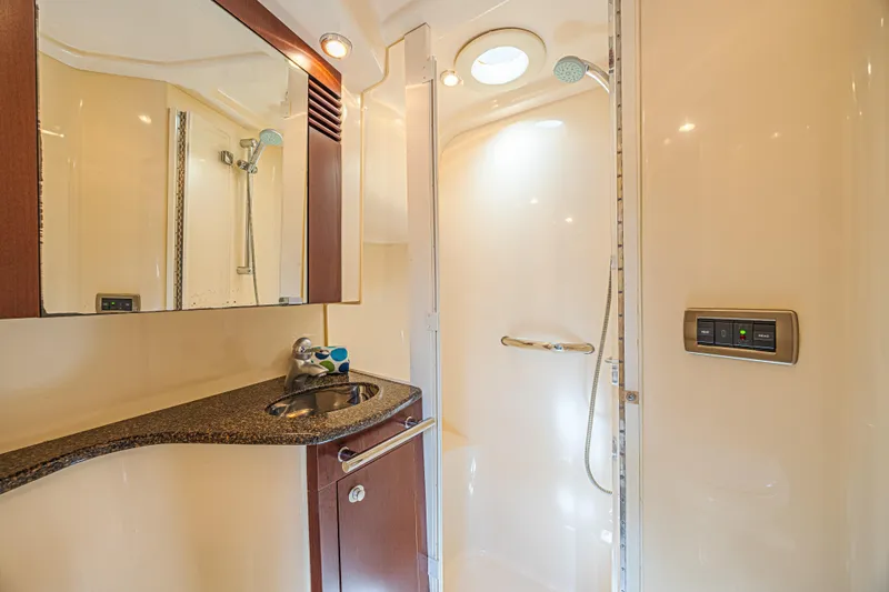 Megusta Yacht Photos Pics Luxurious bathroom in 2007 Sea Ray 44 Sedan Bridge yacht with modern fixtures.