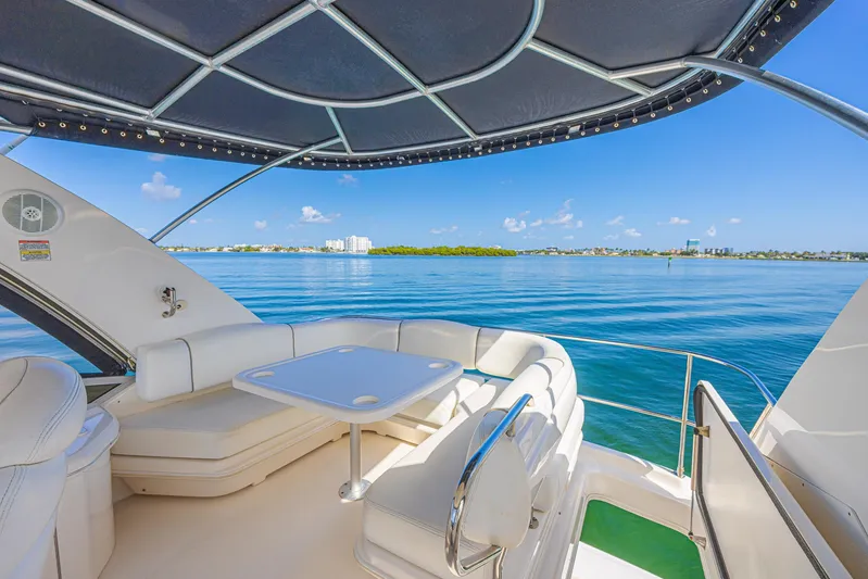 Megusta Yacht Photos Pics 2007 Sea Ray 44 Sedan Bridge yacht with spacious seating and ocean view.