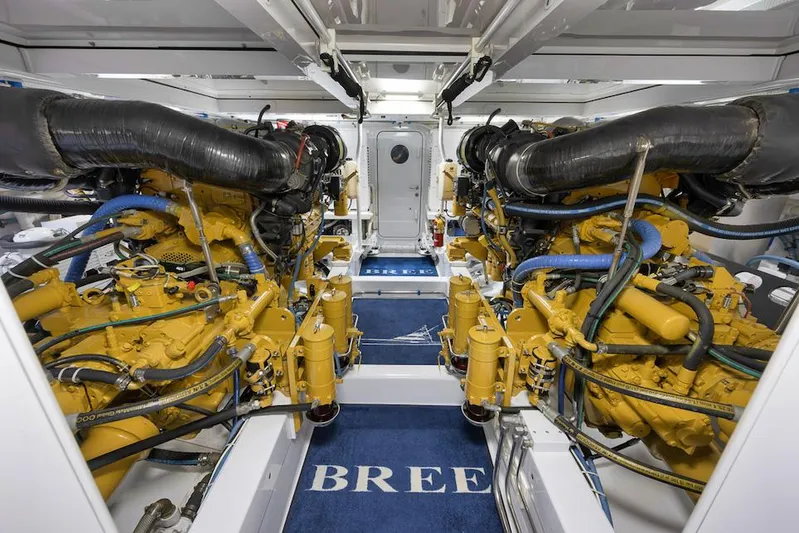 Bree Yacht Photos Pics Engine room of 2016 Merritt 86' Enclosed Flybridge yacht, showcasing powerful dual engines.