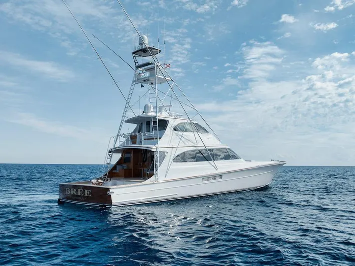 Bree Yacht Photos Pics 2016 Merritt 86' Enclosed Flybridge yacht on open sea under blue sky.
