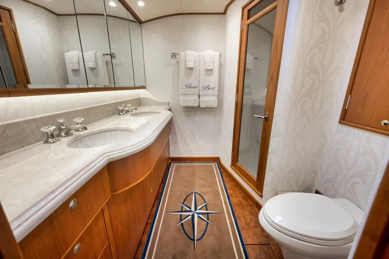 Bree Yacht Photos Pics Luxurious bathroom in 2016 Merritt 86' Enclosed Flybridge yacht with elegant fixtures.