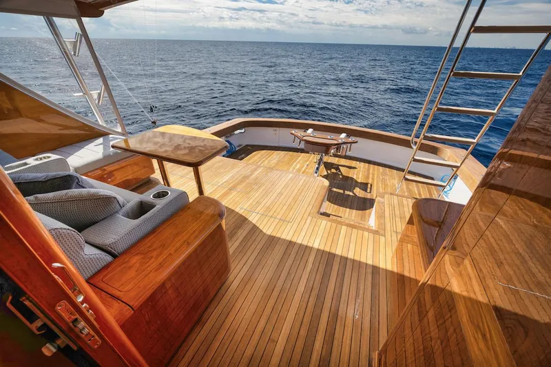 Bree Yacht Photos Pics Luxurious 2016 Merritt 86' yacht deck with ocean view and wooden flooring.