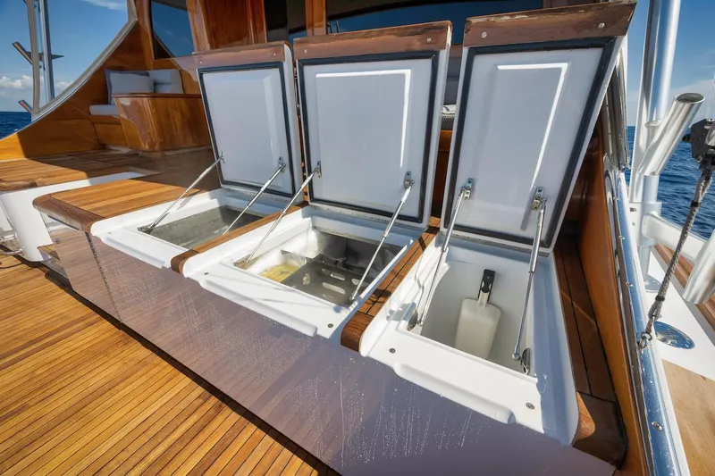 Bree Yacht Photos Pics Open storage compartments on 2016 Merritt 86' Enclosed Flybridge yacht deck.