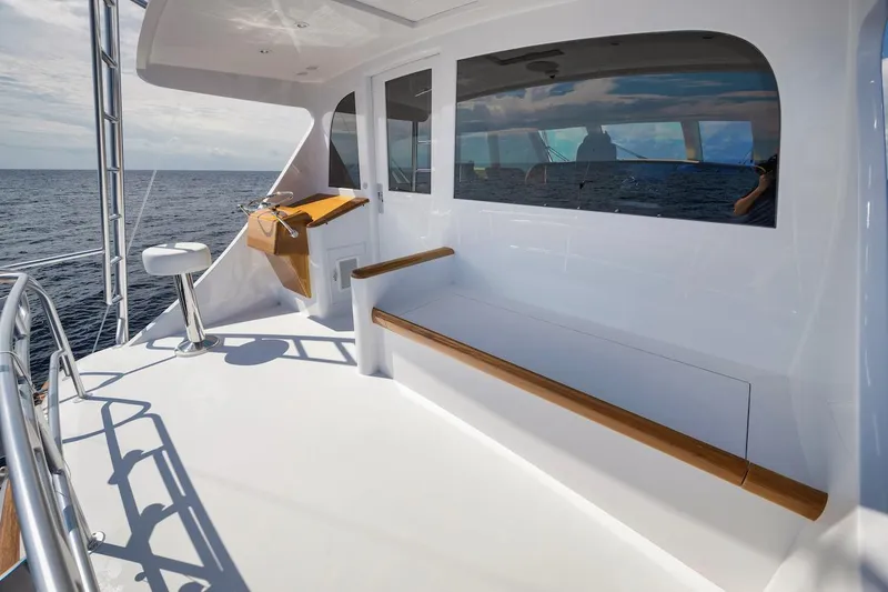 Bree Yacht Photos Pics 2016 Merritt 86' Enclosed Flybridge yacht deck with seating and ocean view.