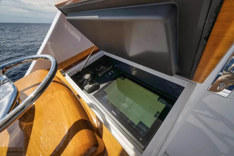 Bree Yacht Photos Pics Control panel of 2016 Merritt 86' Enclosed Flybridge yacht with navigation display.