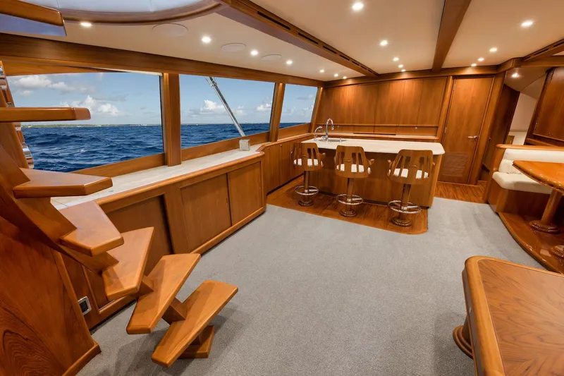 Bree Yacht Photos Pics Luxurious interior of 2016 Merritt 86' Enclosed Flybridge yacht with ocean view.