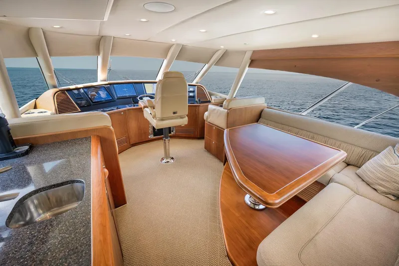 Bree Yacht Photos Pics Luxurious interior of 2016 Merritt 86' Enclosed Flybridge yacht with ocean view.
