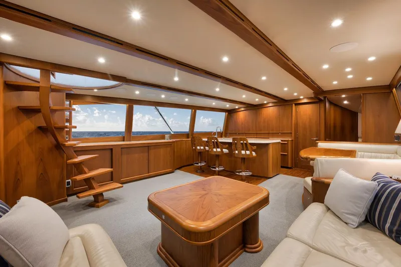 Bree Yacht Photos Pics Luxurious interior of 2016 Merritt 86' Enclosed Flybridge yacht with elegant wood finishes.