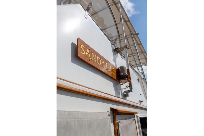 Sandy Isles Yacht Photos Pics 1993 Grand Banks 46 Motoryacht with "Sandy Isles" nameplate, partial view.