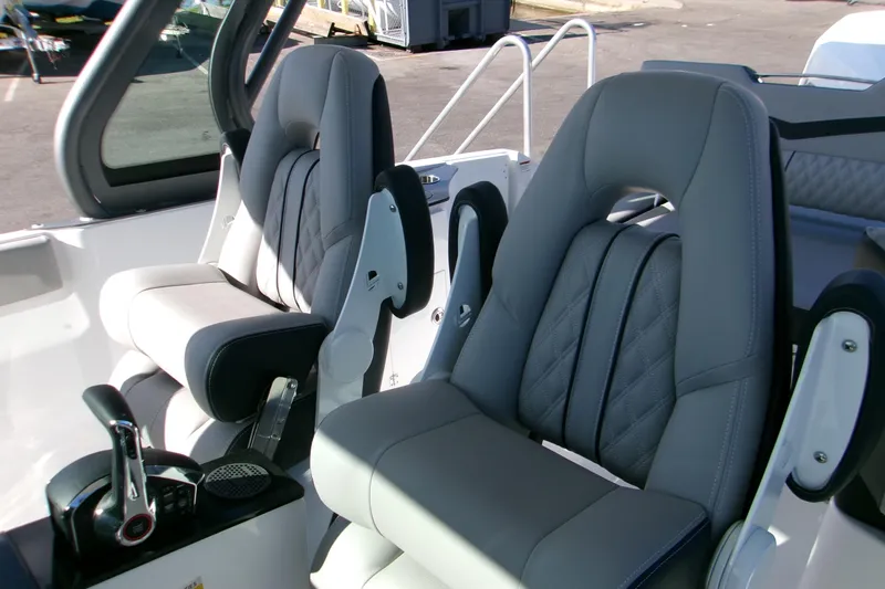  Yacht Photos Pics Luxury seating in 2026 Monterey Elite 25 OB boat, featuring modern design and comfort.