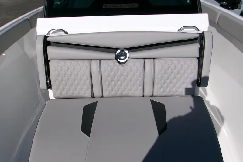  Yacht Photos Pics 2026 Monterey Elite 25 OB boat interior with luxurious quilted seating design.