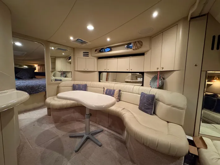 Castaways Yacht Photos Pics Luxurious interior of 2000 Sea Ray 380 Sundancer yacht with plush seating and modern design.