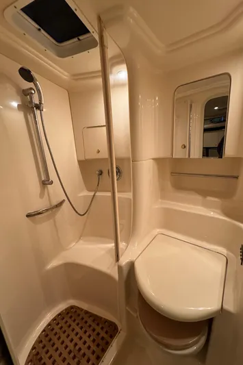 Castaways Yacht Photos Pics Bathroom interior of 2000 Sea Ray 380 Sundancer yacht with shower and toilet.