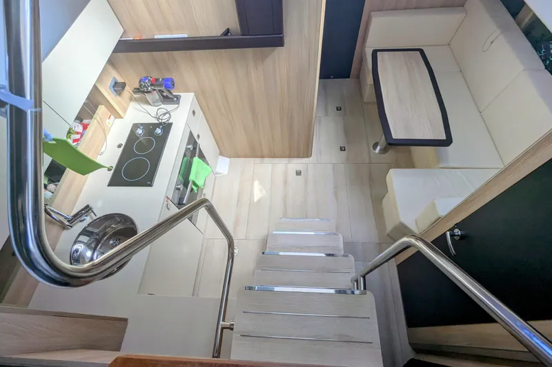  Yacht Photos Pics Interior of 2016 Cranchi M 44 HT yacht with modern kitchen and seating area.