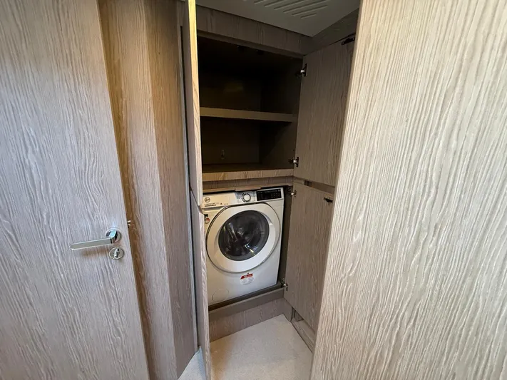  Yacht Photos Pics Laundry area with washing machine in 2025 Azimut Fly 53 yacht.