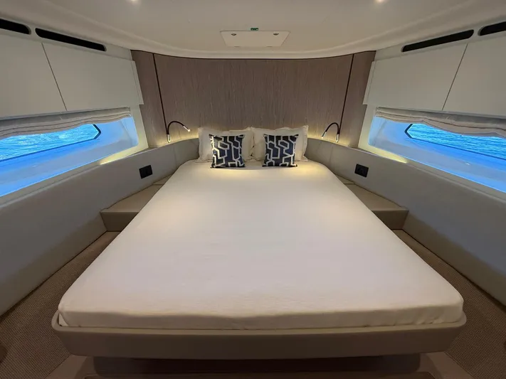  Yacht Photos Pics Luxurious bedroom interior of 2025 Azimut Fly 53 yacht with modern design.