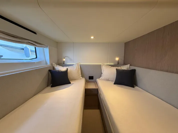  Yacht Photos Pics 2025 Azimut Fly 53 yacht cabin with twin beds and modern decor.