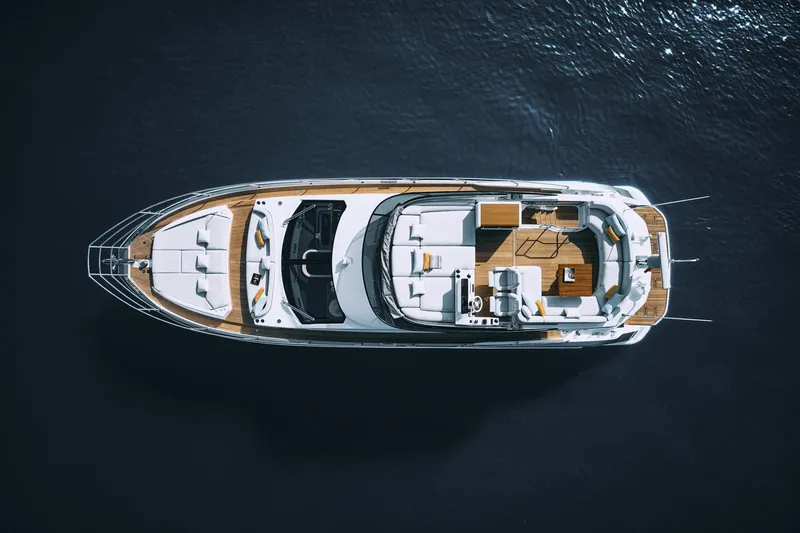  Yacht Photos Pics Aerial view of 2023 Azimut Fly 53 luxury yacht on calm water.