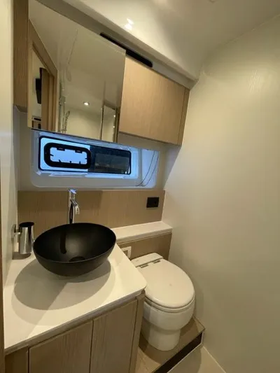  Yacht Photos Pics 2023 Azimut Fly 53 yacht bathroom with modern sink and toilet.