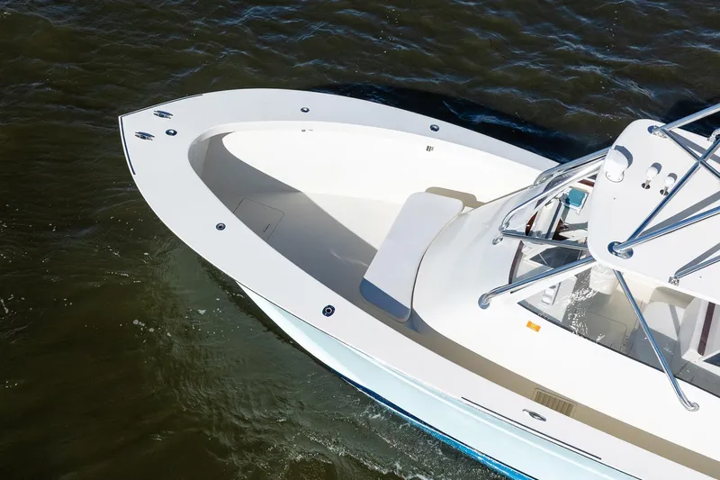 Reese Lee Yacht Photos Pics 2003 Gamefisherman 34 Express boat on water, aerial view of bow and deck.